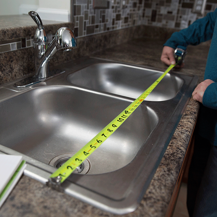 Example of a new kitchen sink being installed